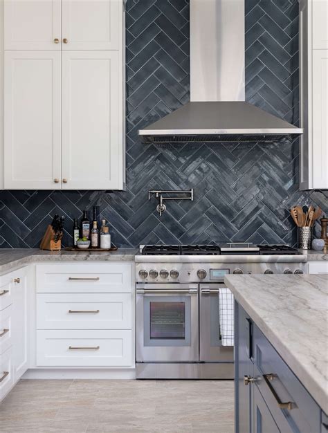 handmade herringbone backsplash tile.